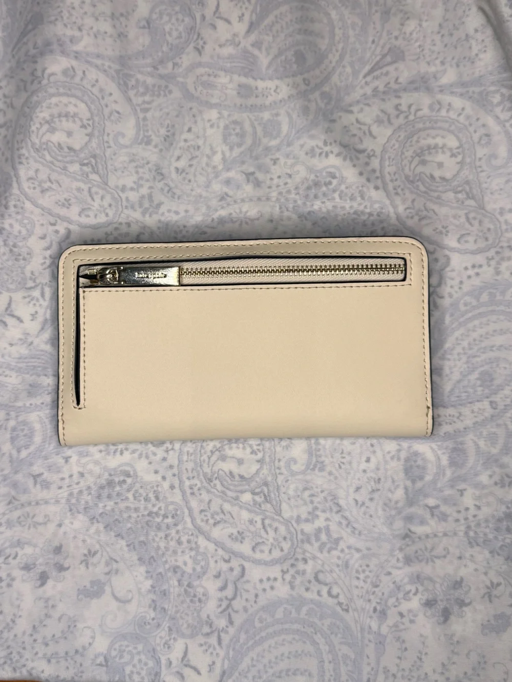 kate spade cream zip